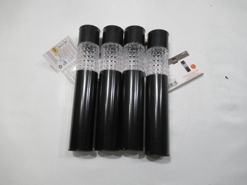 lot 200 image: NEW 4 Pack of Living Accents Black Solar Powered LED Bollard Lights