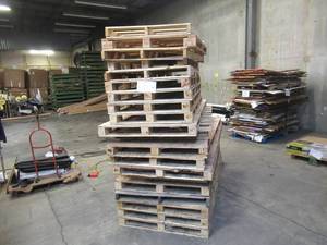 lot 100 image: Stack of 20 Oversized Wooden Pallets