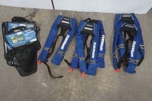 lot 23 image: Evinrude inflatable life jackets