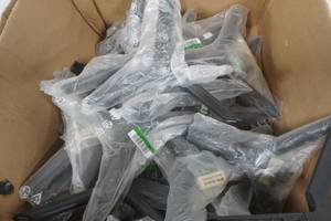 lot 103 image: Samsung Smart TV Legs-large lot. For up to 55 TVs. Approx 24 Ct.