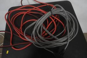 lot 122 image: heavy duty extension cords. length unknown