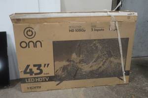 lot 77 image: ONN 43 LED TV with remote, powers on