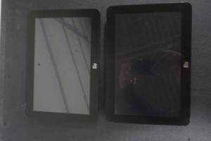 lot 93 image: 2 Elo tablets, no cords, model # ET1002L-2UWA-1-G