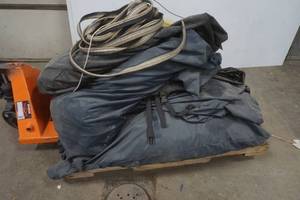 lot 175 image: large pallet of tarps