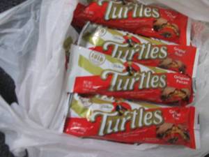 lot 153 image: 12- 1.76 oz Turtles Candy Bars...