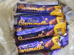 lot 186 image: 12- 2.7 oz Cadbury Caramello...
