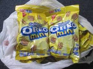 lot 198 image: 12- 3.0 oz Golden Mini Oreos...