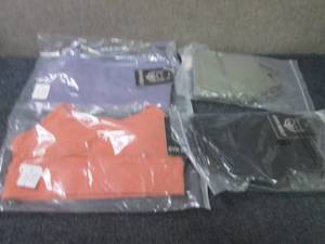 lot 335 image: 4 Small Gym Wolf Sports Bras...