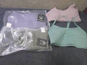 lot 336 image: 4 Small Gym Wolf Sports Bras...