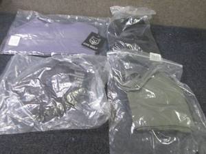 lot 338 image: 4 Small Gym Wolf Sports Bras...