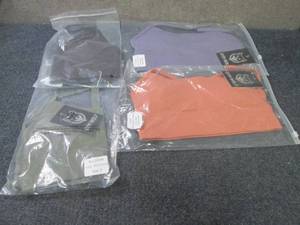lot 339 image: 4 Small Gym Wolf Sports Bras...