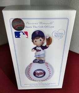 lot 38 image: Precious Moments Minnesota Twins Boy Musical Figurine