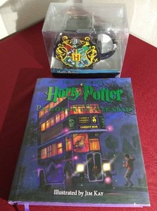 lot 61 image: Harry Potter Lot - Collectible Mug & Book
