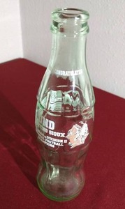 lot 64 image: 2001 UND Fighting Sioux Football Champions Coke Bottle