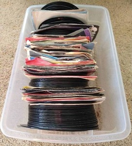 lot 84 image: Tote of 45s Records