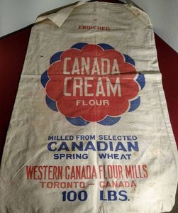 lot 115 image: Vintage Canada Cream 100lb Flour Sack