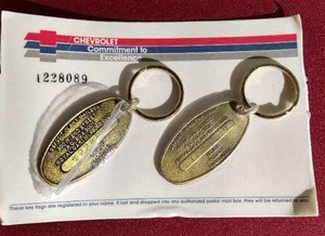lot 119 image: Vintage Chevy Brass Keychains