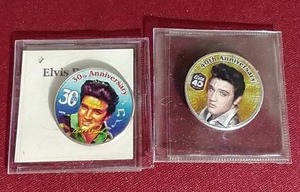 lot 178 image: (2) Elvis Presley 50c Pieces