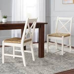 lot 36 image: Home Decorators Collection Dorsey Ivory Wood Dining Chair with Cross Back and Rush Seat (Set of 2) (17.72 in. W x 35.43 in. H)Customer Returns See Pictures