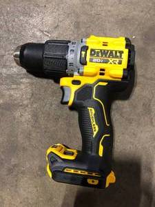 lot 7 image: DEWALT 20V Compact Cordless 12 in. Hammer Drill (Tool Only)   Customer Returns See Pictures