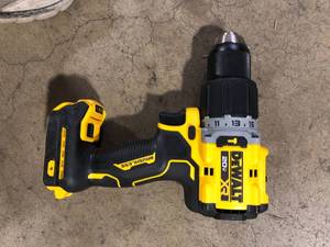lot 42 image: DEWALT 20V Compact Cordless 12 in. Hammer Drill (Tool Only)  Customer Returns See Pictures