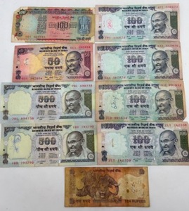 lot 34 image: India 9 Piece Set 10 to 100 Rupees Paper Bank Notes For Money Collection
