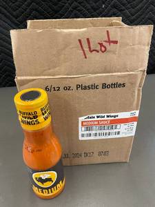 lot 20 image: 2 bck - Set of 6 Buffalo Wild Wings Medium Sauce Bottles