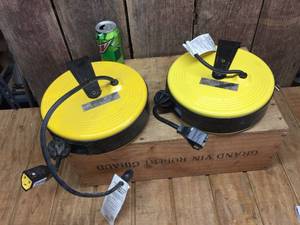 lot 114 image: 2 Bayco 25ft Retractable Ext. Cords