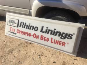 lot 130 image: Rhino Linings Acrylic Dealer Sign - 6ft x 2ft