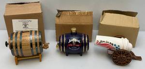 lot 26 image: Jim Beam Collectible Barrel & Cannon Decanters  (EMPTY)