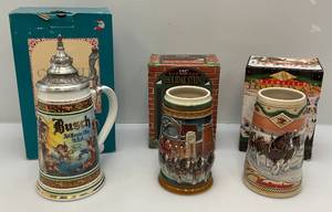 lot 39 image: 1990s Budweiser Holiday Steins (NIB)