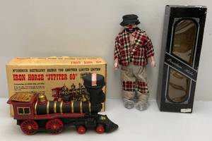 lot 46 image: Vintage Porcelain Hobo Doll In Original Box & McCormick Distillery Iron Horse Jupiter 60 Train Decanter In Original Box (EMPTY)