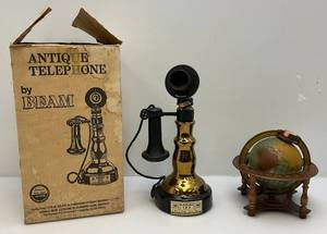 lot 75 image: Two Vintage Jim Beam Collectible Decanters Including Telephone In Original Box & Globe