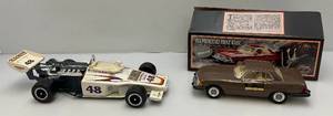 lot 102 image: Vintage Jim Beam Collectible 1974 Mercedes Benz 450SLCar With Original Box & Olsonite Eagle Indy Car Decanters (EMPTY)