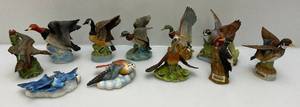 lot 114 image: Misc. Vintage Ski Country Miniature Wildlife Decanters  6 12 And Smaller