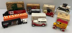 lot 132 image: Misc. Jim Beam Die Cast Miniatures, Banks & More (NIB)