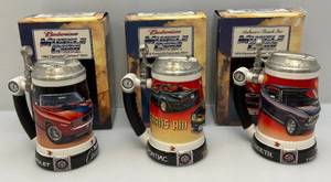 lot 145 image: Misc. Anheuser Busch Collector Muscle Car Steins Including 1969 Camaro, 1970 Plymouth Hemi Cuda & 1976 Firebird Trans Am (NIB)