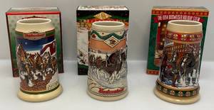 lot 173 image: Collectible Budweiser Holiday Beer Steins  (NIB)