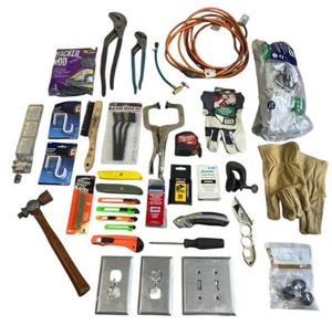 lot 9 image: Amazing Tool Lot including Milwaukee 25ft Wide Blade Tape Measure, Vintage Shaler Tire Tube Repair Clamp, Utility Knives, and More