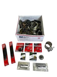 lot 23 image: Huge Lot of Exhaust Pipe Clamps and More