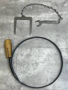 lot 55 image: FORD Model T Band Changing Tool, T Band Clamp, and Wrench