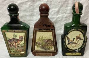 lot 29 image: Vintage Jim Bean James Lockart Wildlife Whiskey  Decanters - Fox, Raccoons and Mallards