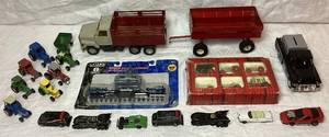 lot 102 image: Ertl Collectibles Bundle of Tractors, Los Angeles Raiders Metal Bank and Cars plus 6 tractors from other Makers