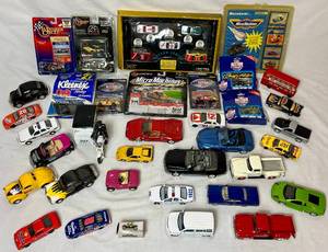 lot 101 image: Assortment of Cars from Various Makers - Winners Circle, Action, Funstuf, Majorette and more