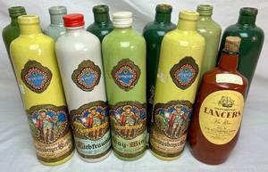 lot 55 image: Vintage Beameister  Stoneware Wine Bottles from Germany and Lancers Vin Rose Portugal