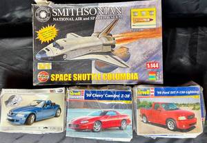 lot 118 image: Vintage Models - Space Shuttle Colombia, 98 Chevy Camaro, 99 Ford SVT F-150 and BMW M Roadster