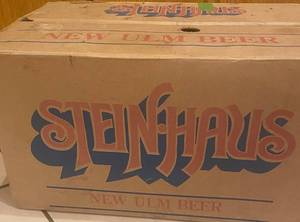 lot 57 image: Stein-Haus Cardboard Case Box  and 23 -12oz Longneck Bottle New Ulm Beer and 1-Schells Bottle
