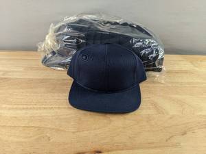 lot 261 image: 13 Brand New Yupoong Snap Back Navy Hats Size Youth A