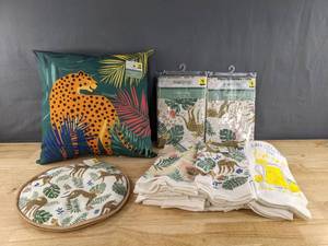 lot 282 image: 14 Brand New Kitchen Towels, Tablecloth and Tortilla Warmer in a Variety of Decorative Floral and Safari Prints D