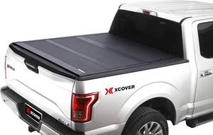 lot 142 image: Chevy  GMC Xcover Low Profile Hard Folding Truck Bed Tonneau Cover, Fits 2019 - 2025 Chevrolet SilveradoGMC Sierra 1500 5.8 Ft Bed